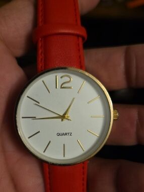 Minimalist Gold-Tone Watch with Red Leather Strap